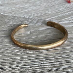 Alex and Ani, “Higher Power” Gold Bangle Bracelet.